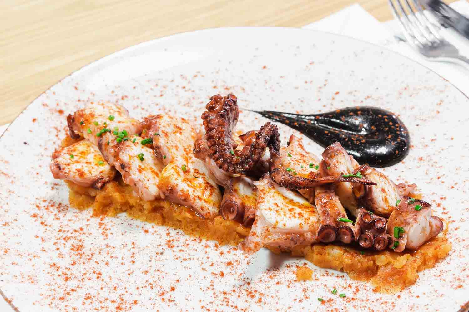 Braised octopus with roast potatoes