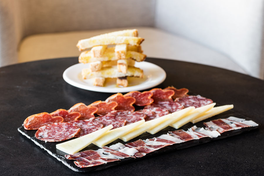Iberian assortment table. (Iberian Ham,cane of loin,cheese,salami)