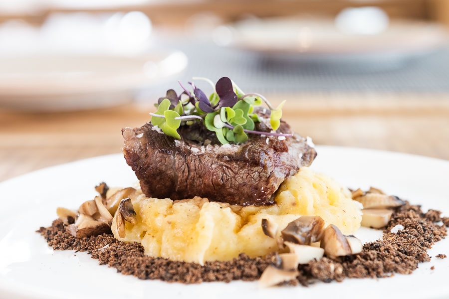 Grilled beef tenderloin with truffled potato pureé and chopped mushrooms