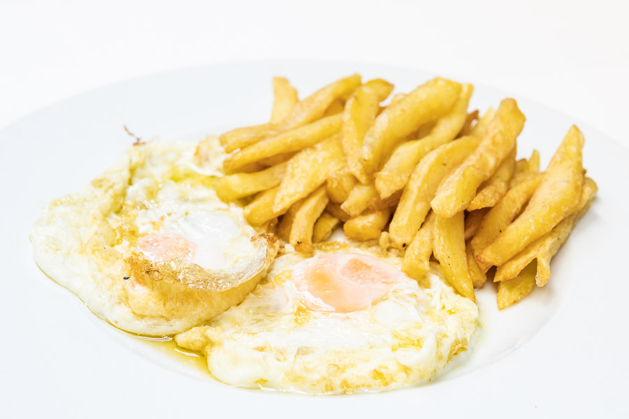 Fried eggs with french fries