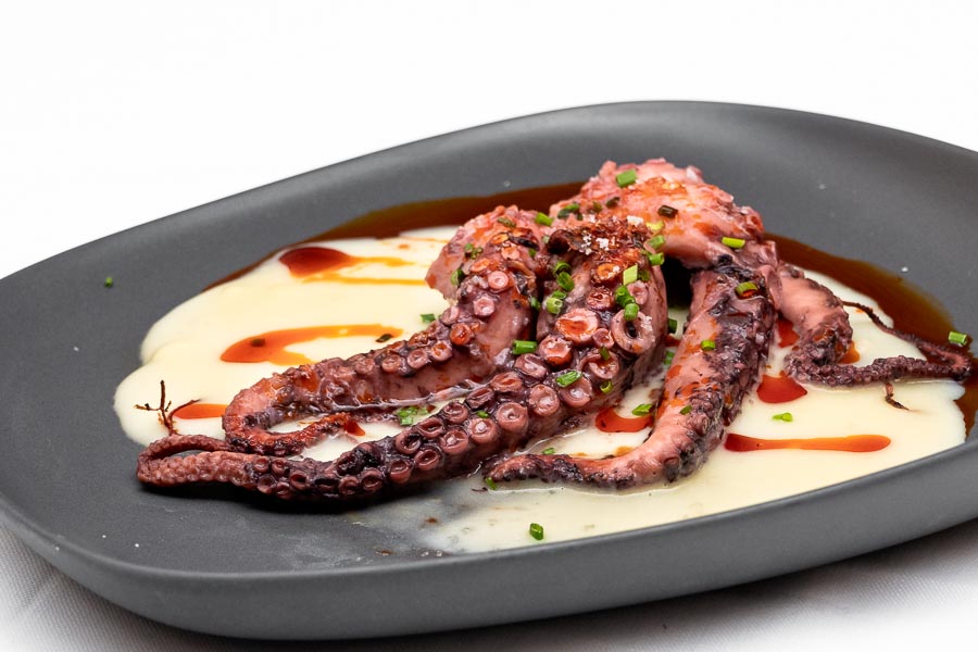 Octopus on the grill with De la vera paprika oik and potatoe cream
