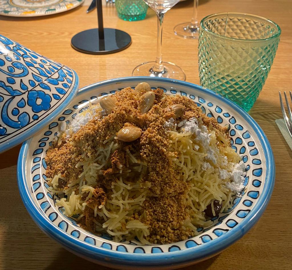 Seffa (based on noodles with chicken in sauce, raisins, almonds and cinnamon)