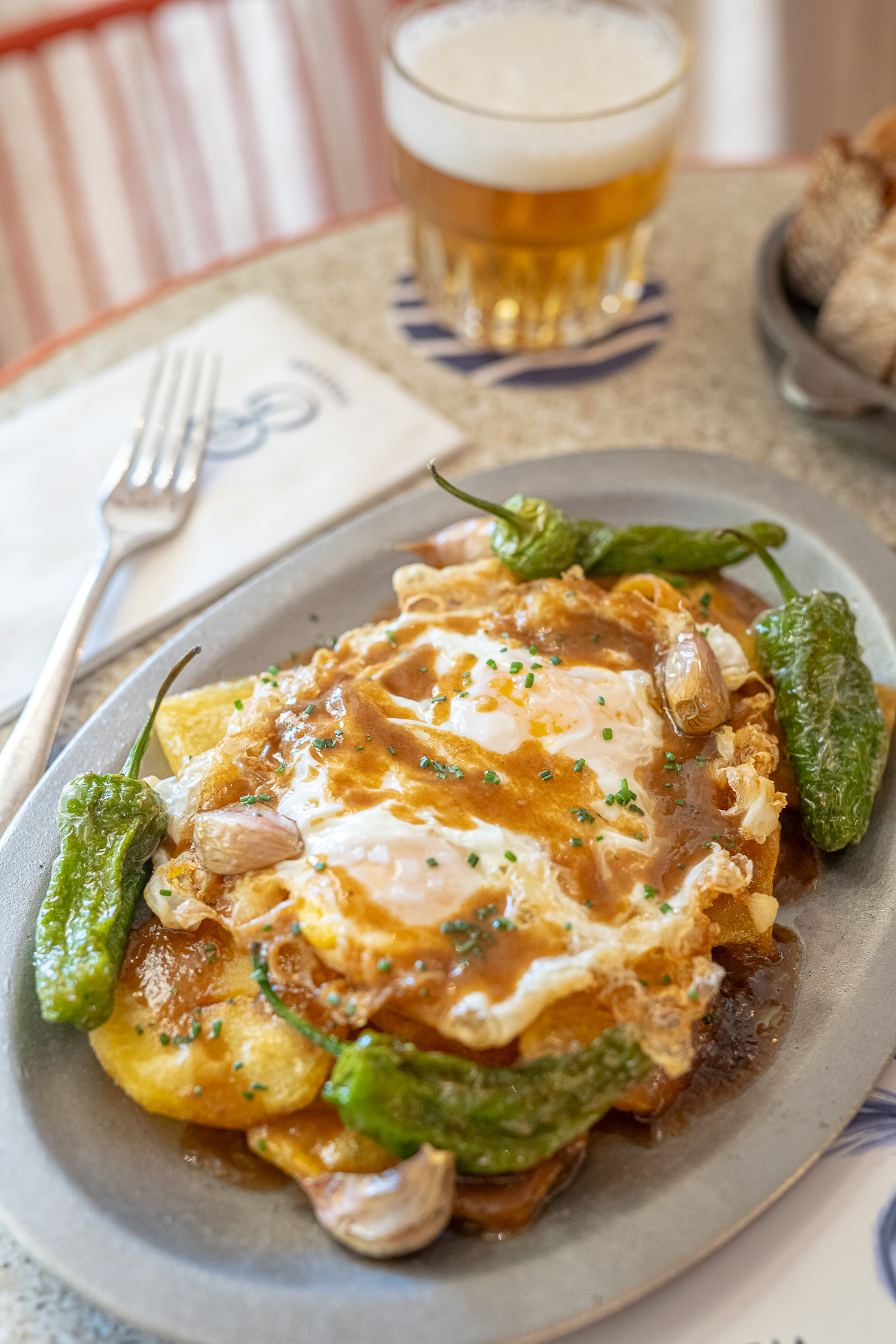 Scrambled eggs with Padrón peppers and whiskey sauce