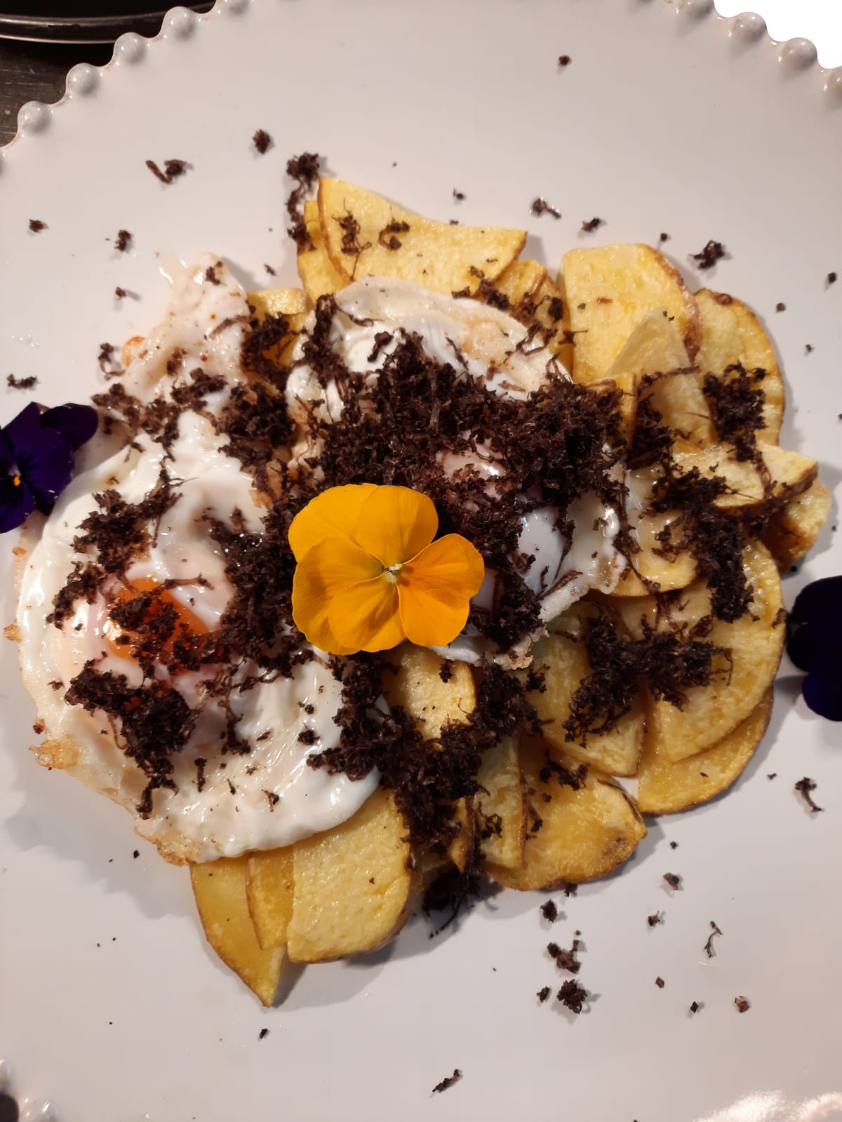 Fried eggs with Black Truffle