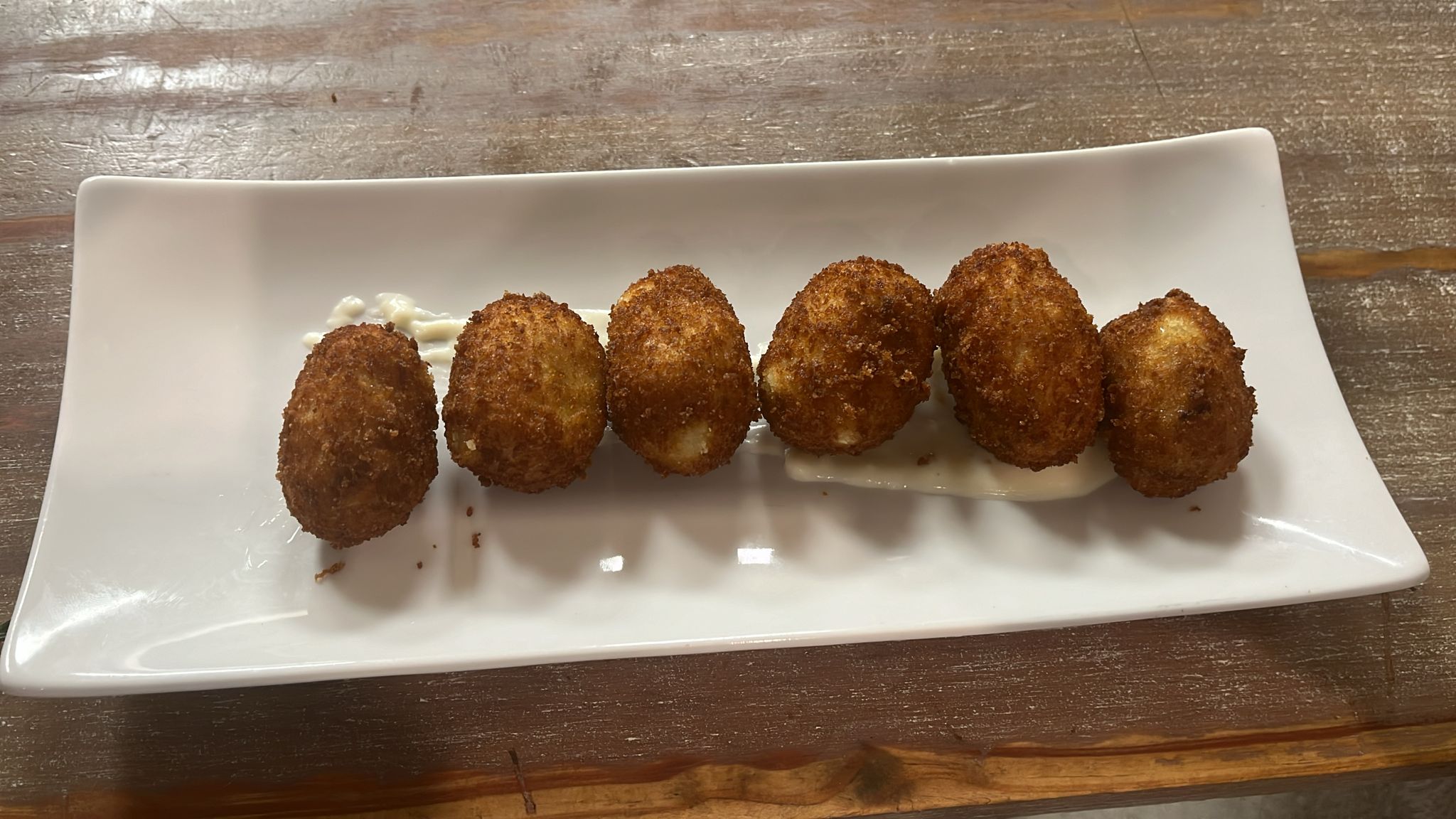 Duck magret croquettes with pork rinds