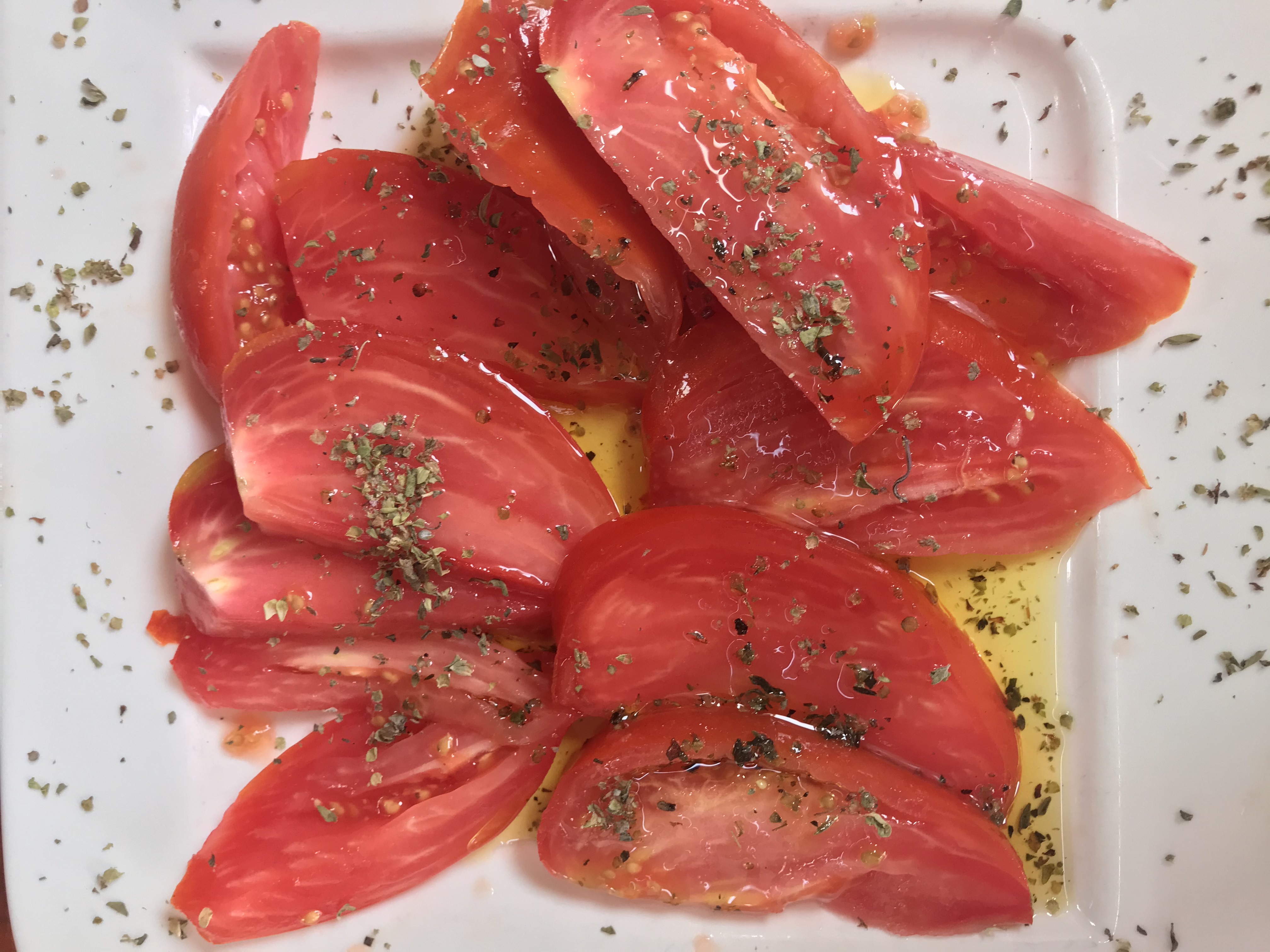 Raf tomato with anchovies and Mediterranean dressing