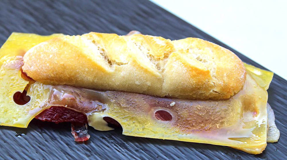 Hot sandwich of iberian ham and emmental cheese