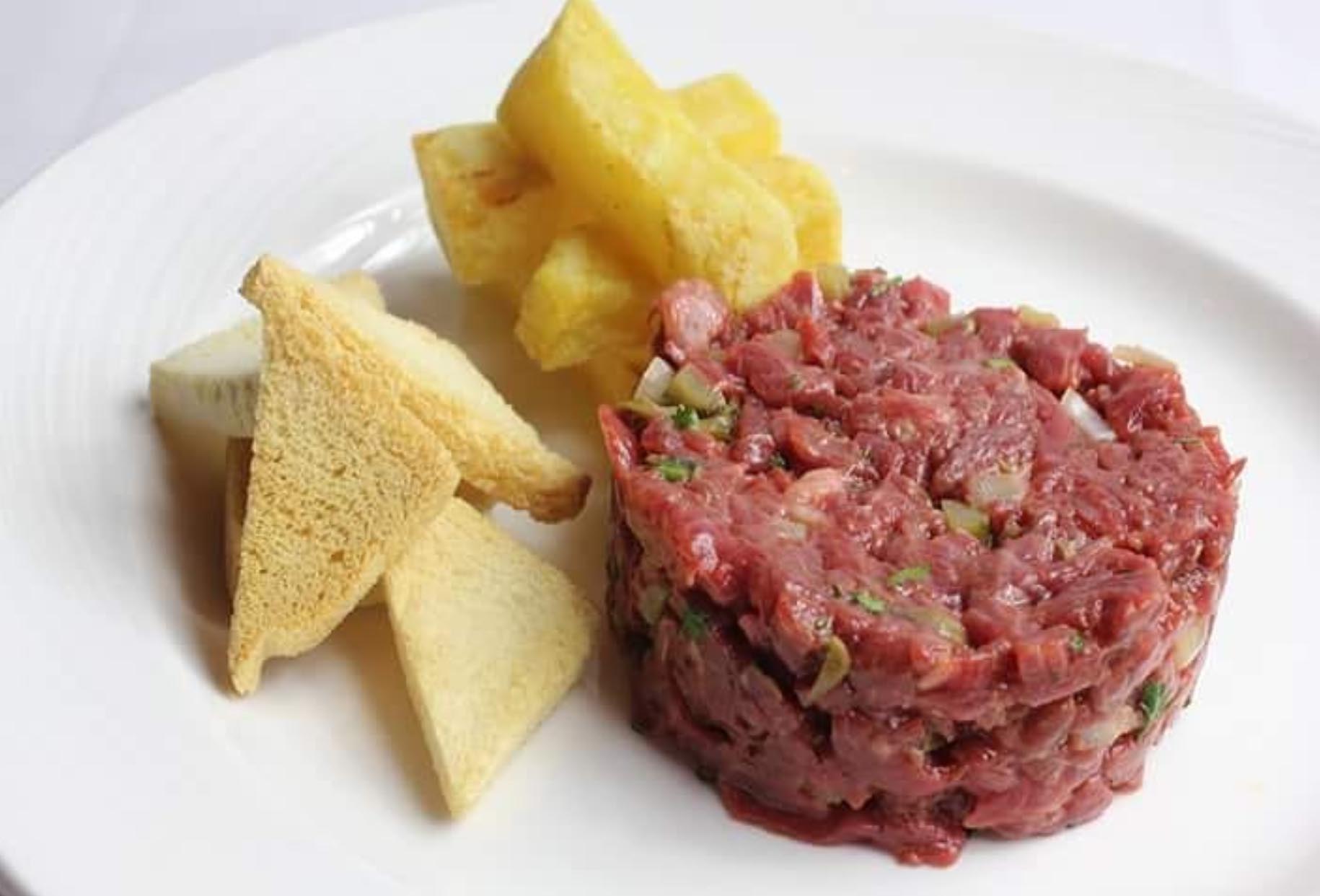 French-style Steak Tartare prepared in room with Puente Nuevo Potatoes