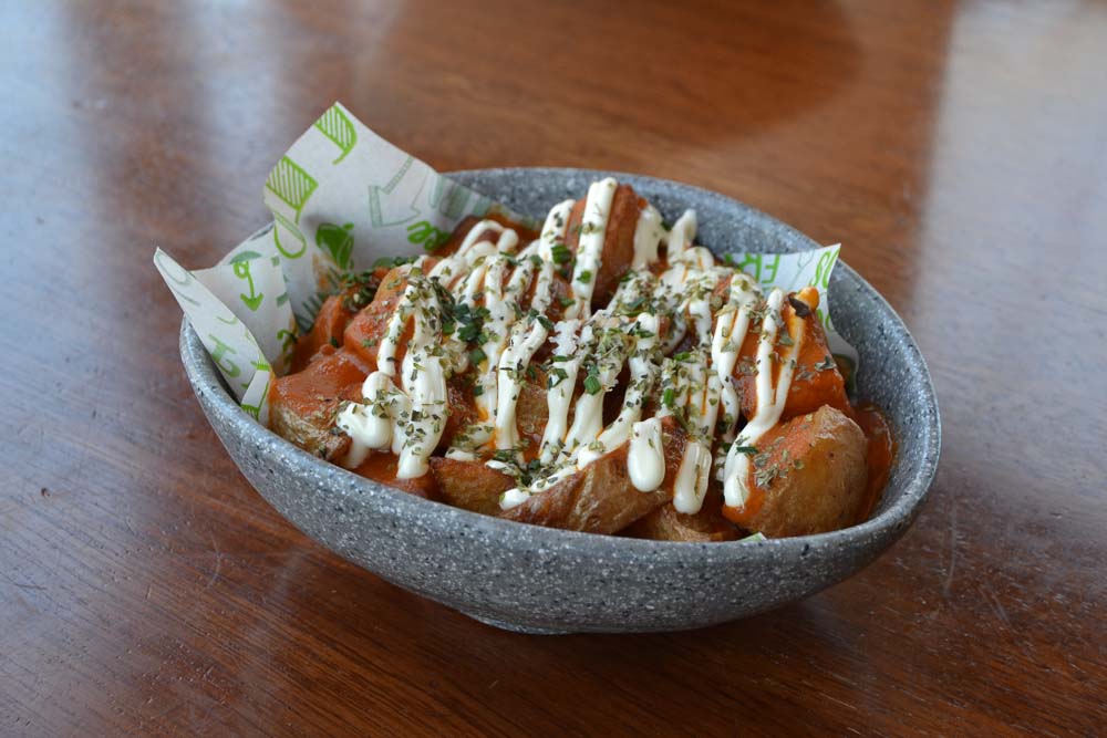 Our 'bravas' potatoes with two hot sauces