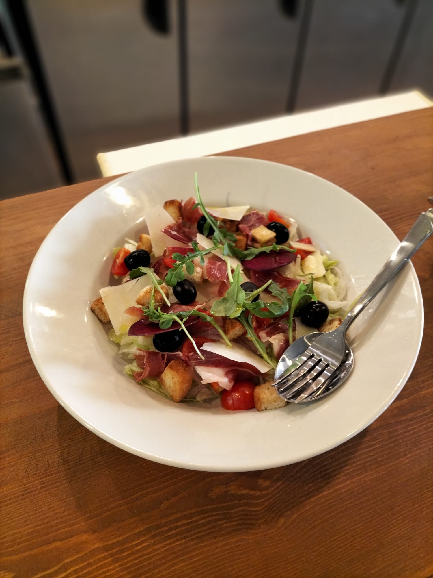 Iberian Ham Salad with Lettuce, Cherry Tomatoes, Cheeses, olives and croutons.