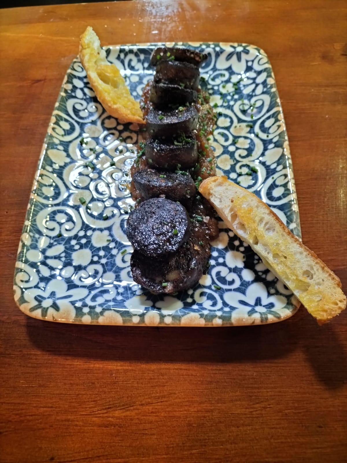 Grilled black pudding, onion compote, honey and vinegar