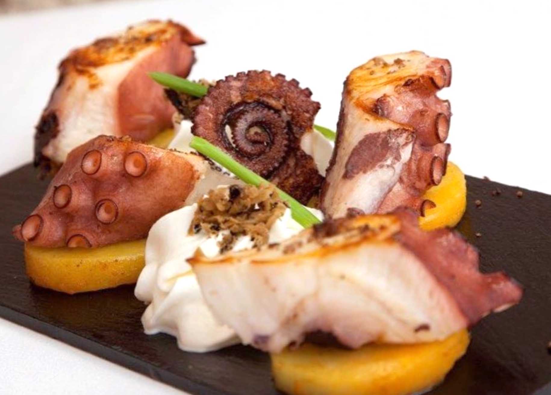 Grilled Octopus on Paprika Potatoes and White Asparagus Foam from Navarra and Trufa