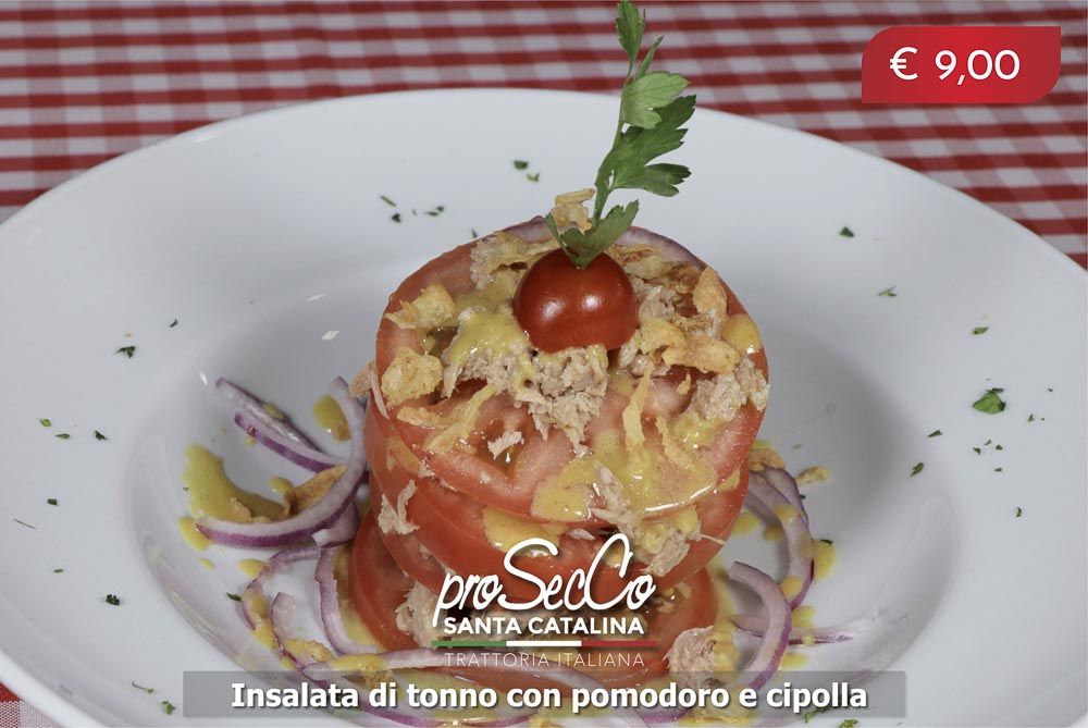 Tuna salad with tomato, onion and Dijon mustard and honey vinaigrette